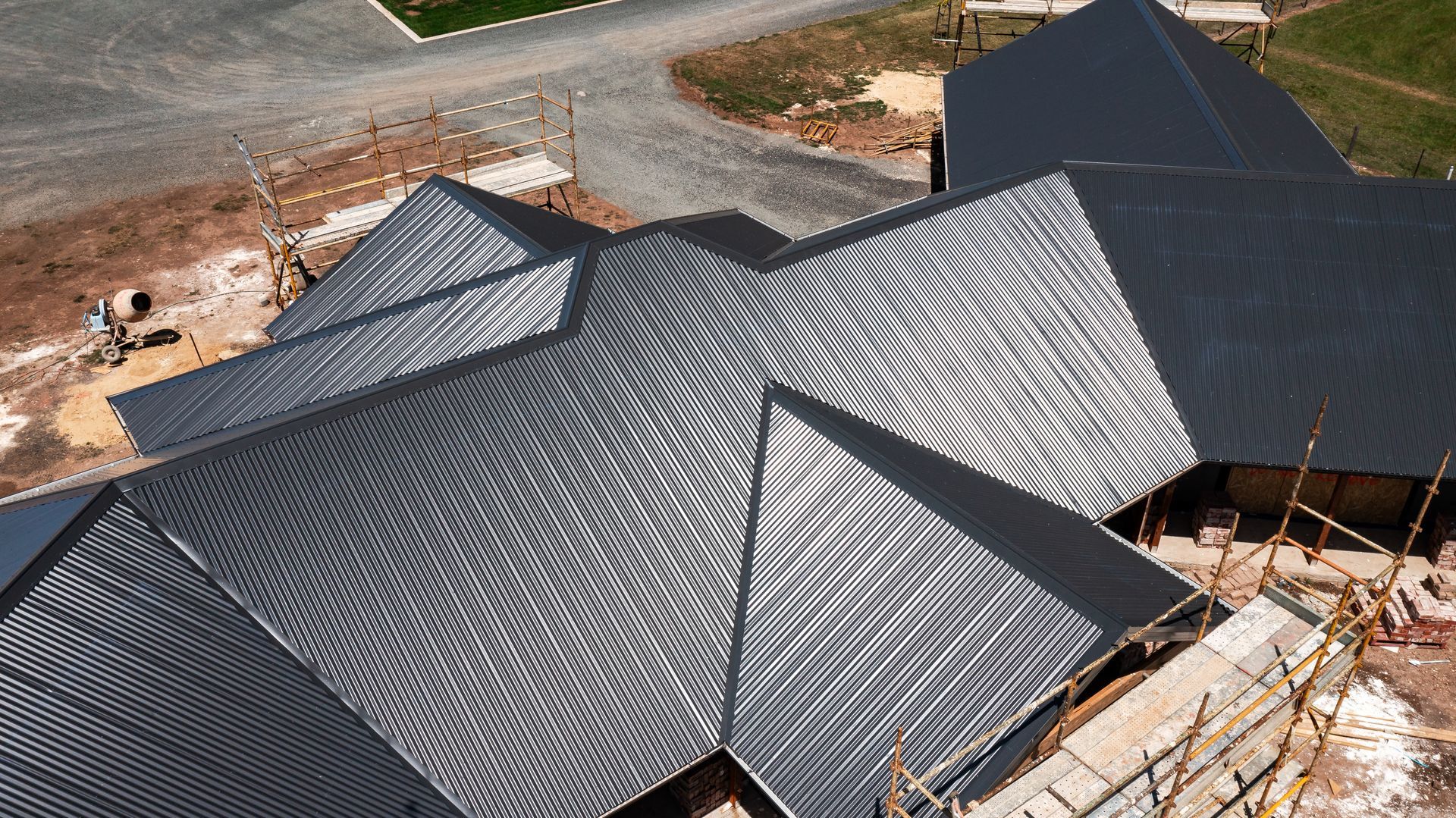 Vicwest Roofing team inspecting roof installation